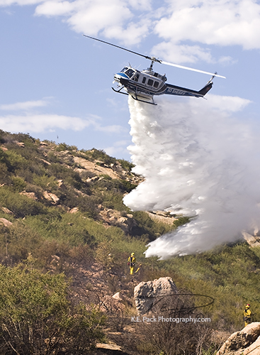 San Diego County Sheriff Copter dropping water on hotspot.